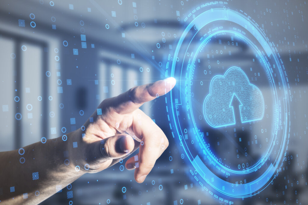 A sleek futuristic cloud technology interface featuring interactive holographic displays, digital connectivity, and advanced data visualization in a modern high-tech environment.