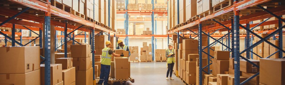 Retail,Warehouse,Full,Of,Shelves,With,Goods,In,Cardboard,Boxes,