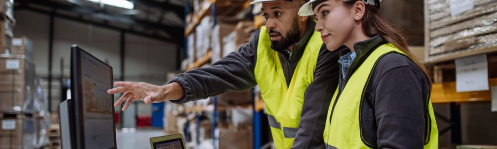 Warehouse,Manager,Talking,With,Logistics,Employee,In,Warehouse,,Planning,Transport