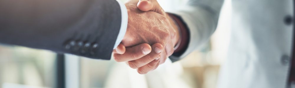 Trust,,Handshake,And,Business,People,In,Office,For,Deal,,Welcome