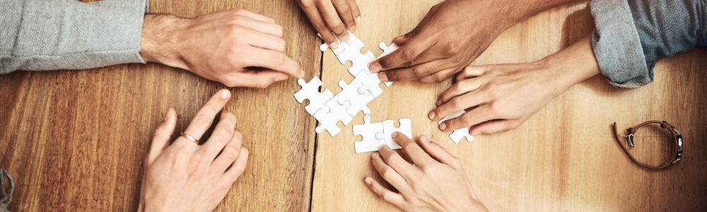 Puzzle,,Above,And,Hands,Of,Business,People,For,Teamwork,,Collaboration